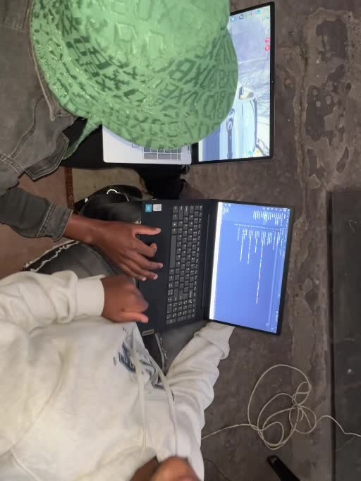 Carlton spirit2k5 working on laptops during a development session